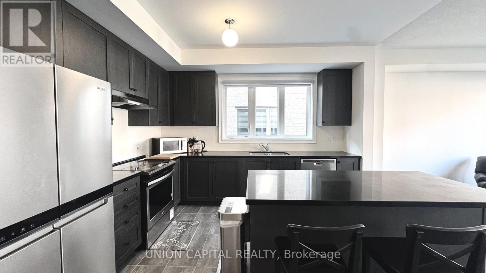 63 Erintol Way, Markham, Ontario  L3S 0E7 - Photo 3 - N12573148