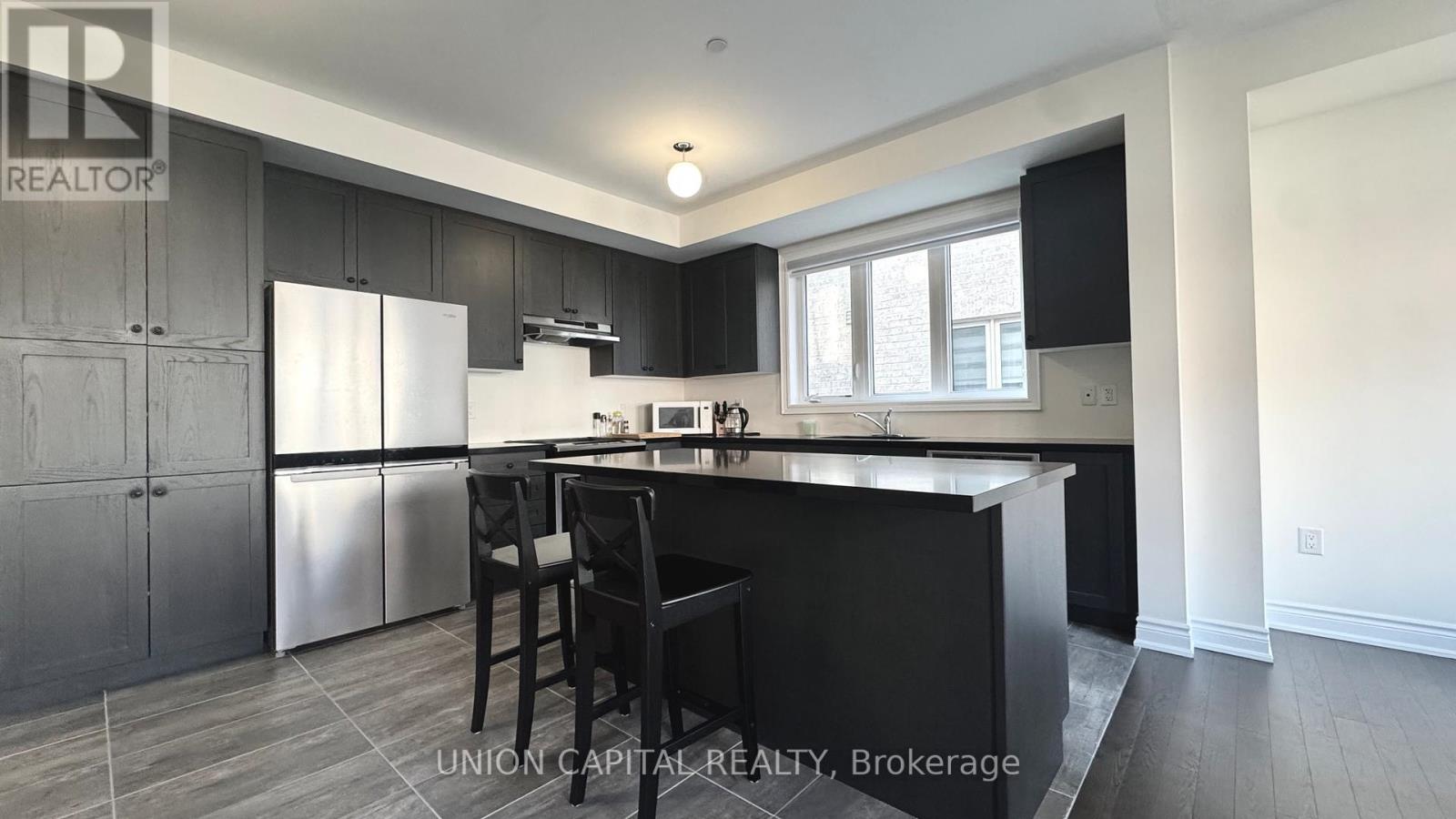 63 Erintol Way, Markham, Ontario  L3S 0E7 - Photo 4 - N12573148