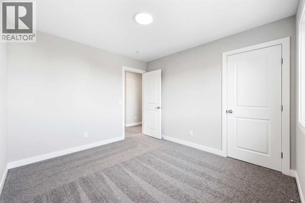 104 Mitchell Walk Nw, Calgary, Alberta  T3R 2G2 - Photo 12 - A2272465