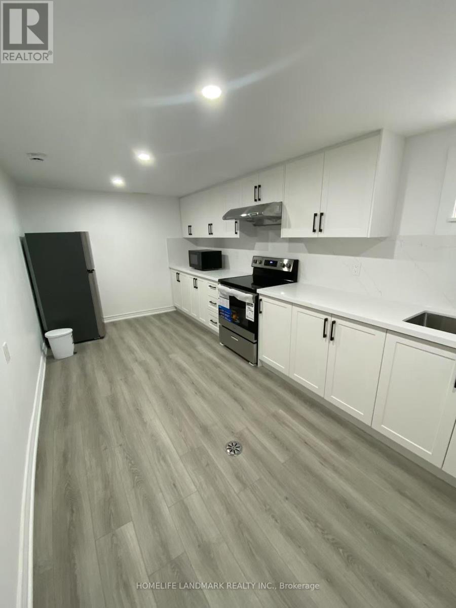 Main Floor - 126 Roywood Drive, Toronto, Ontario  M3A 2E1 - Photo 6 - C12573316