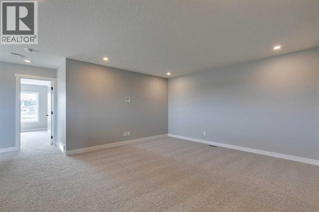 23 Creekstone Green Sw, Calgary, Alberta  T2X 6H6 - Photo 18 - A2268878