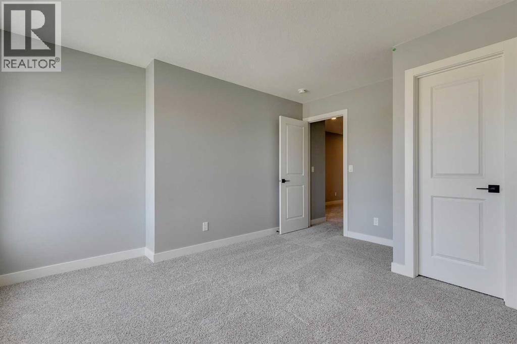 23 Creekstone Green Sw, Calgary, Alberta  T2X 6H6 - Photo 31 - A2268878