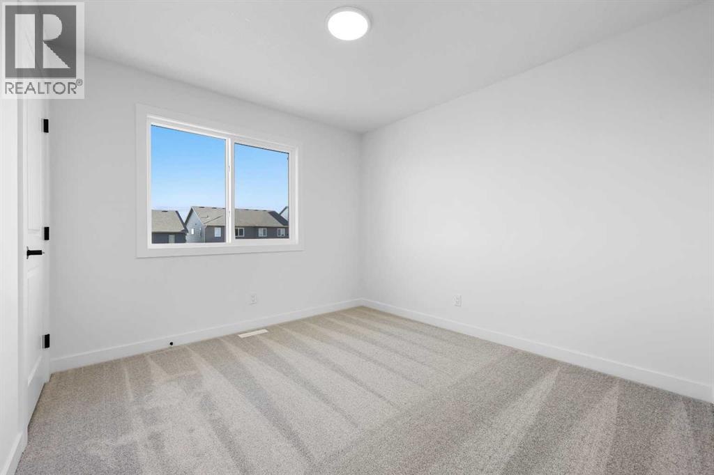 128 Mitchell Walk Nw, Calgary, Alberta  T3R 2G2 - Photo 12 - A2272479