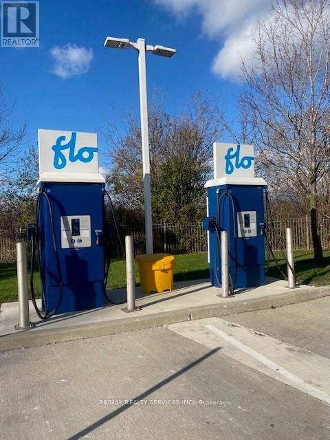 104 - 710 Humberwood Boulevard, Toronto, Ontario  M9W 7J5 - Photo 3 - W12573476