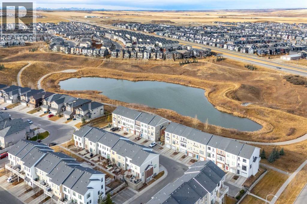 408 Nolanfield Villas Nw, Calgary, Alberta  T3R 0T9 - Photo 3 - A2271626