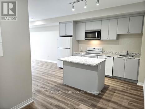 102 - 50 Herrick Avenue, St. Catharines, Ontario  L2P 2S4 - Photo 2 - X12573764