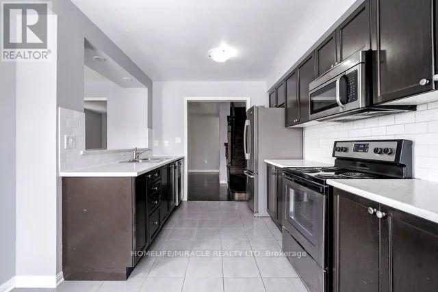 43 Colonel Frank Cheng Crescent, Brampton, Ontario  L6Y 5W4 - Photo 20 - W12573776