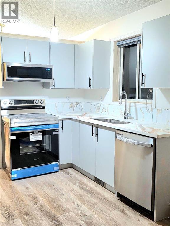 16218 Shawbrooke Road Sw, Calgary, Alberta  T2Y 3C1 - Photo 6 - A2272012