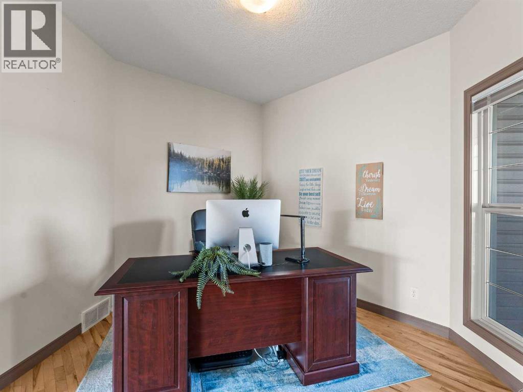 95 Crystal Shores Road, Okotoks, Alberta  T1S 2H9 - Photo 4 - A2272491