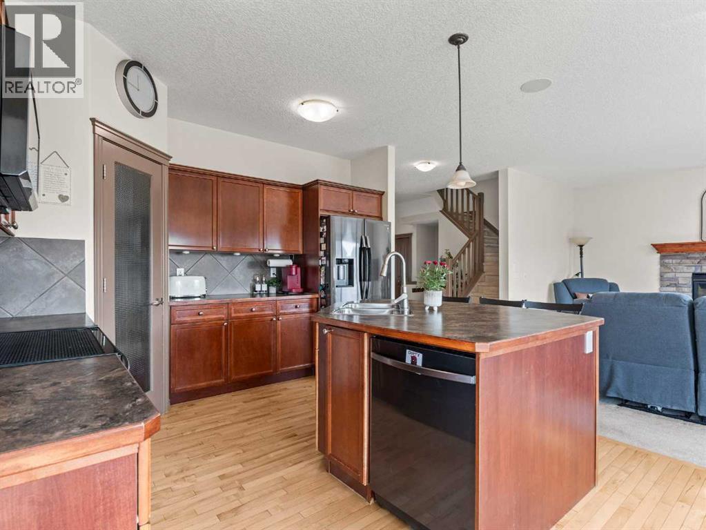 95 Crystal Shores Road, Okotoks, Alberta  T1S 2H9 - Photo 9 - A2272491