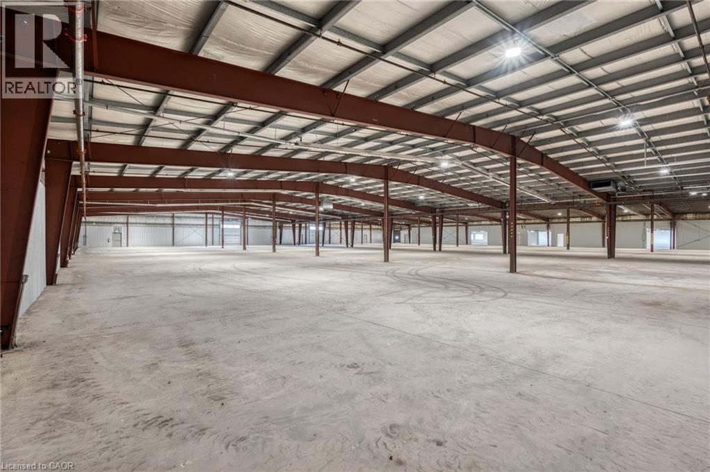 Prime industrial opportunity in Niagara Falls’ Stanley Avenue Business Park with multiple units and configurations of industrial space available for lease.  This specific unit configuration is a fully upgraded and vacant 26,937 sq. ft. of space above grade, with an additional 2,675 sq. ft. in the basement boasting a total of 29,612 sq. ft. in the heart of the Stanley Avenue Business Park, only 5 minutes from the QEW, and 17 minutes from the Peace Bridge.  The unit features a total of 3 bay doors, of which 2 are drive-in doors and 1 is a truck-level loading dock for seamless logistics.  Recent enhancements include a fully fire-certified & monitored building with all-new sprinkler heads, new radiant tube heating, multiple rooftop HVAC units for heating and cooling, completely new Interior/Exterior LED lighting, and 1,200 amp 600 volt service!  The property also has a brand-new torch-down roof over the flex space, along with fresh asphalt.  The property has General Industrial zoning, which is ideal for manufacturing, a carpenter shop, laboratory, machine shop, warehouse, or the like. Outdoor surface parking is available.  This business park has benefited from major infrastructure investments by the City of Niagara, and this turnkey space is truly a standout opportunity.  Come see how this rare vacant gem can elevate your operations! (id:48254)