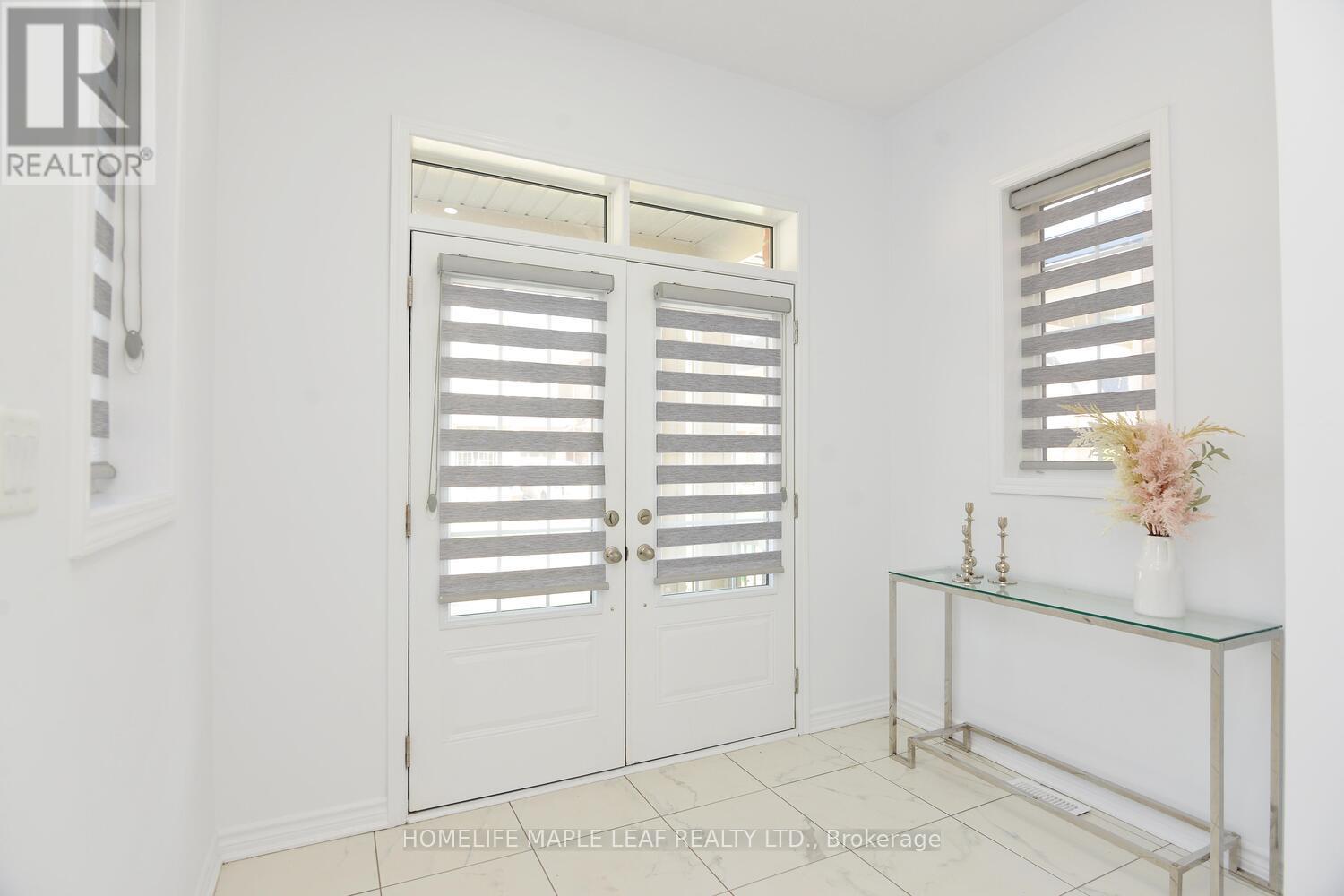 12 Eberly Woods Drive, Caledon, Ontario  L7C 4H8 - Photo 4 - W12574278