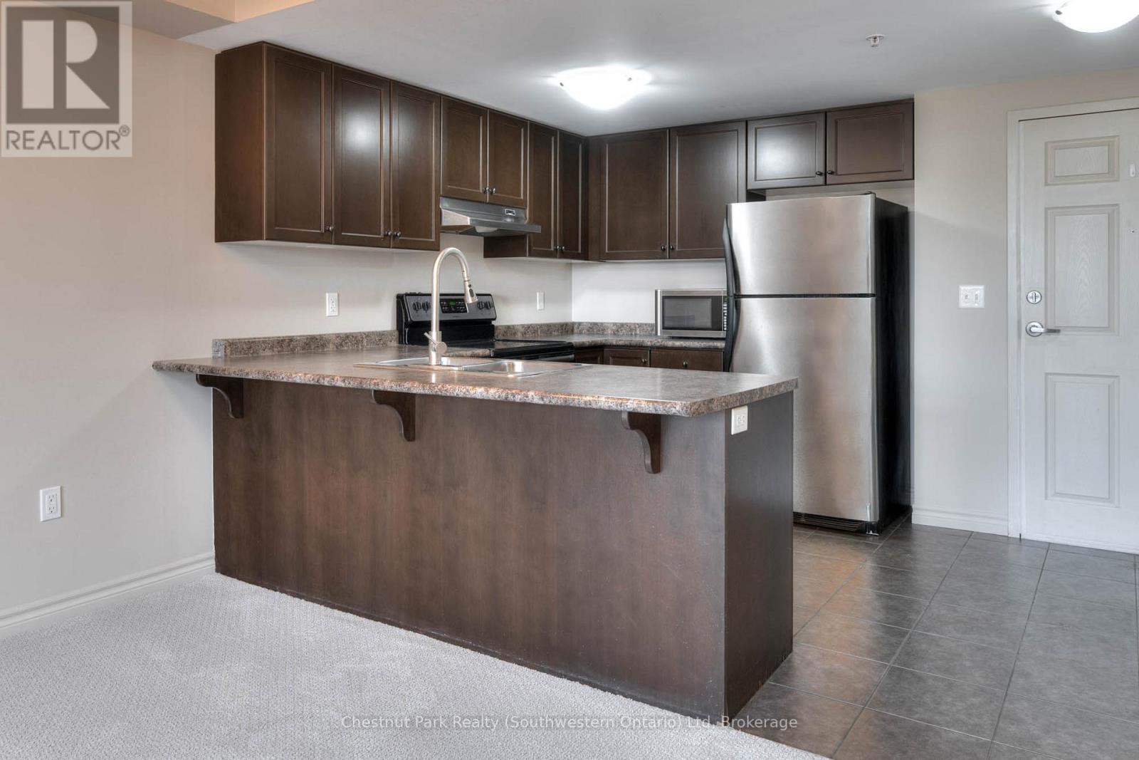 103 - 19 Waterford Drive, Guelph, Ontario  N1L 0G8 - Photo 7 - X12574460