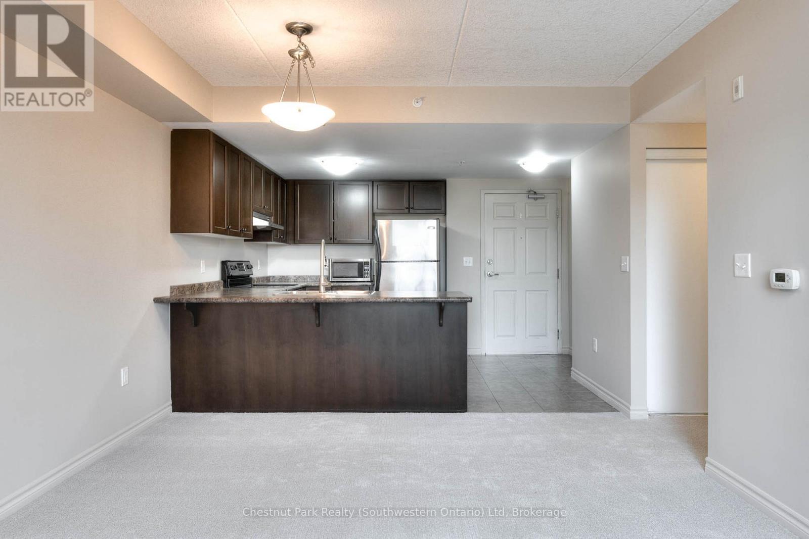 103 - 19 Waterford Drive, Guelph, Ontario  N1L 0G8 - Photo 8 - X12574460