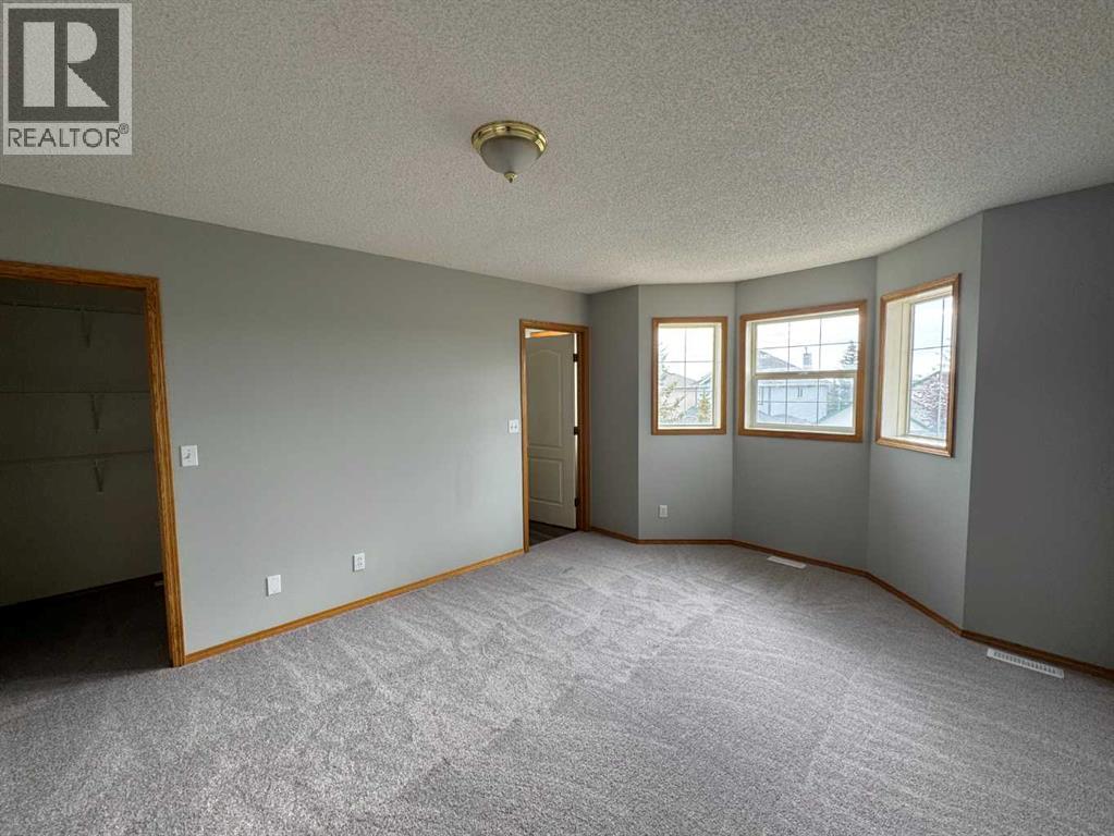 22 Arbour Butte Road Nw, Calgary, Alberta  T3G 4L7 - Photo 18 - A2260725