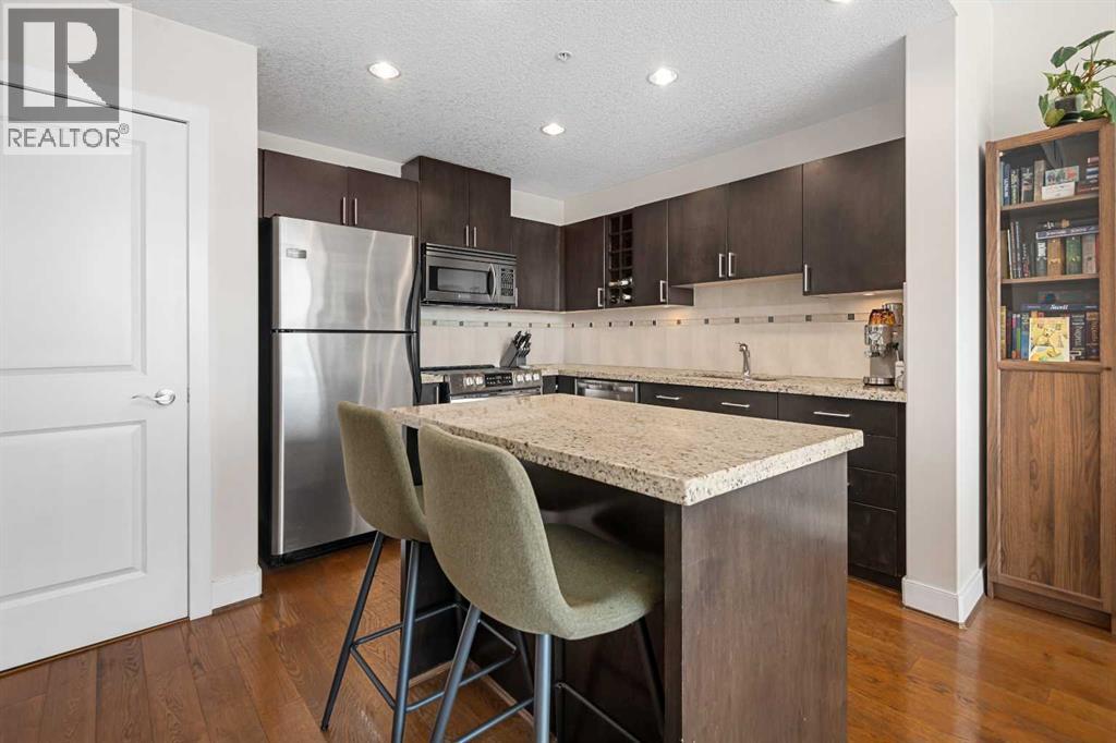 2005, 77 Spruce Place Sw, Calgary, Alberta  T3C 3X6 - Photo 6 - A2243634