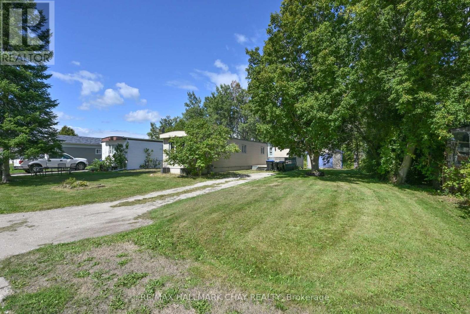 32 Shamrock Crescent, Essa, Ontario  L3W 0A5 - Photo 2 - N12575262