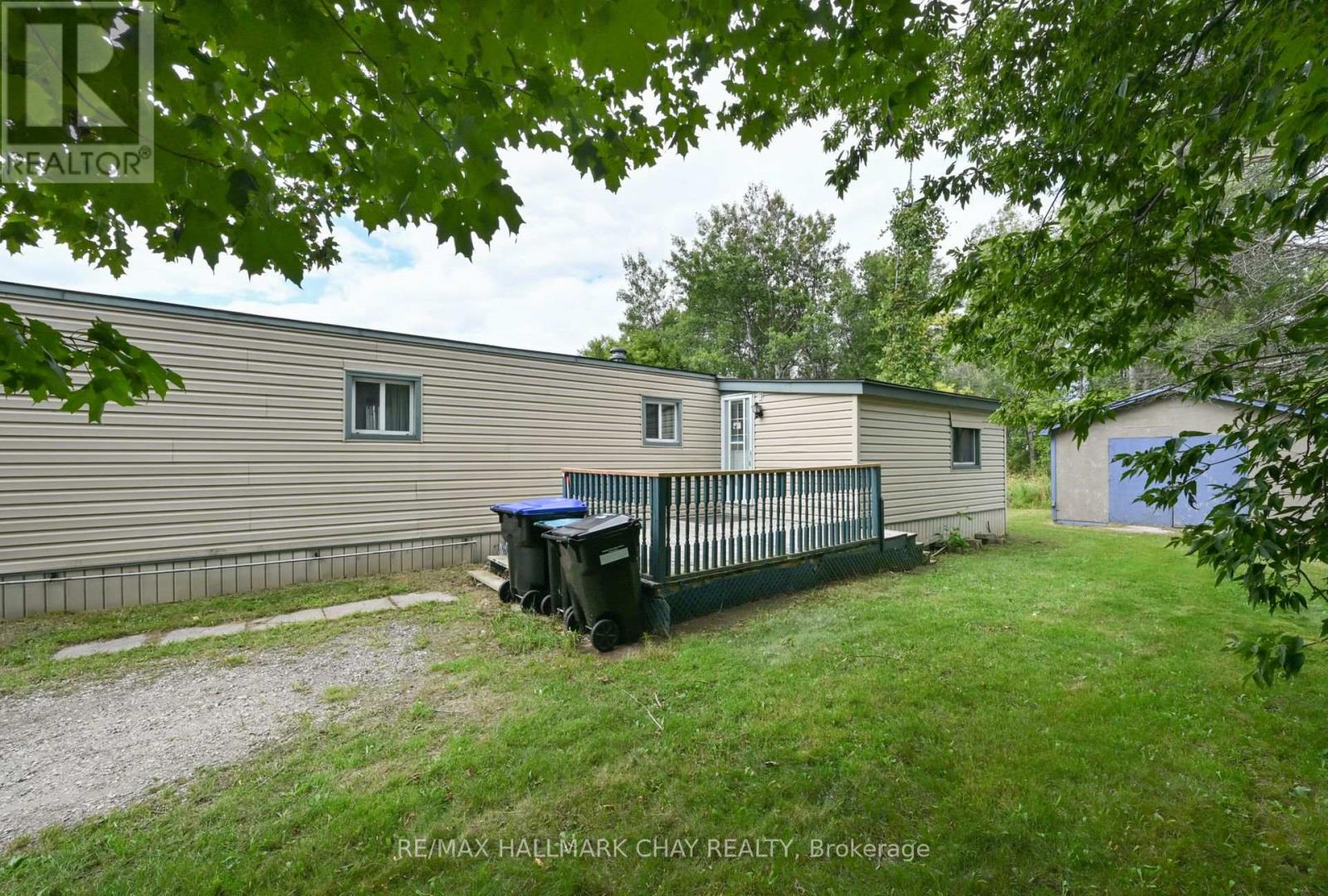 32 Shamrock Crescent, Essa, Ontario  L3W 0A5 - Photo 3 - N12575262