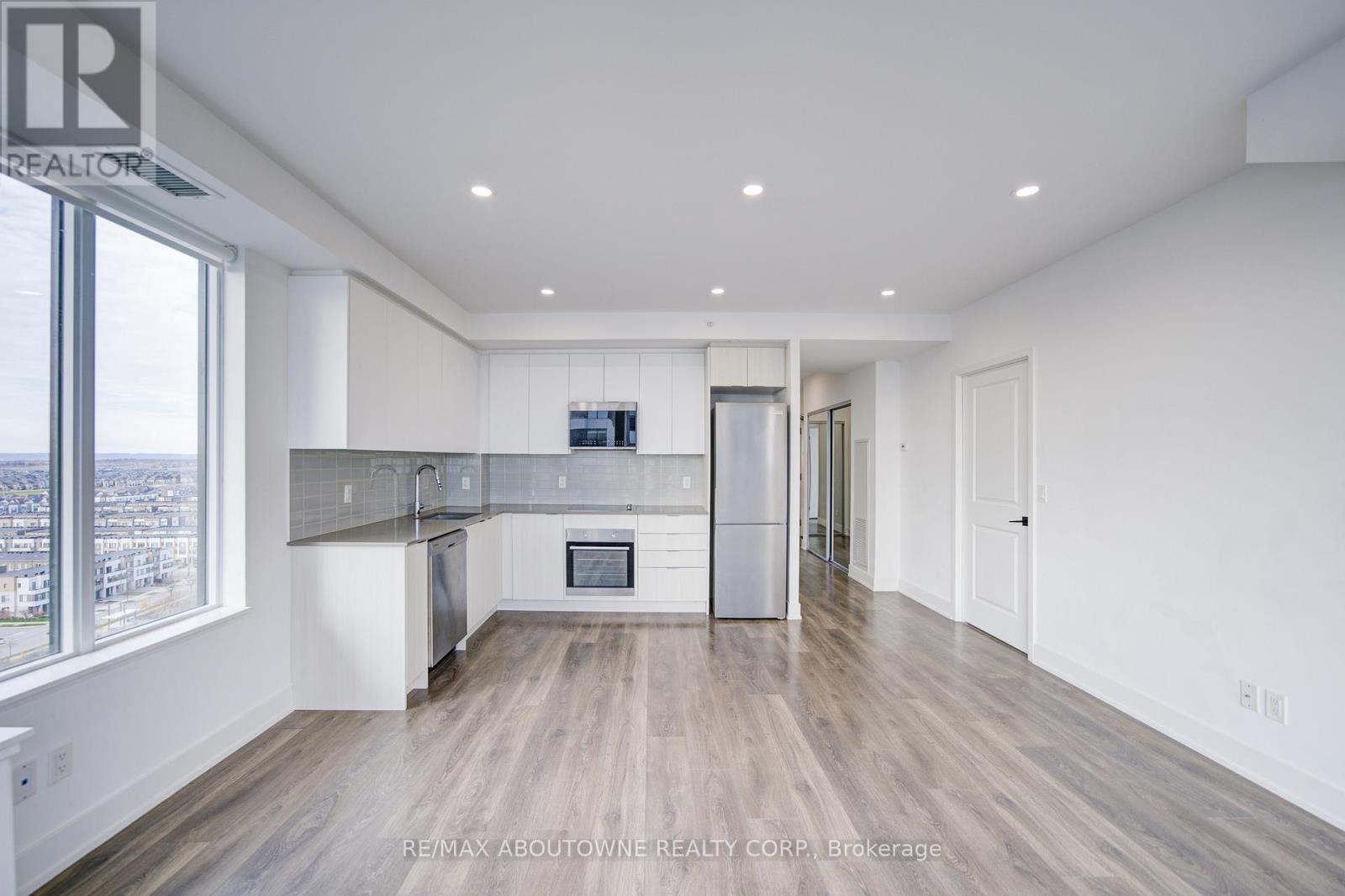 1313 - 2489 Taunton Road, Oakville, Ontario L6H 3R7 - Photo 4 - W12484941