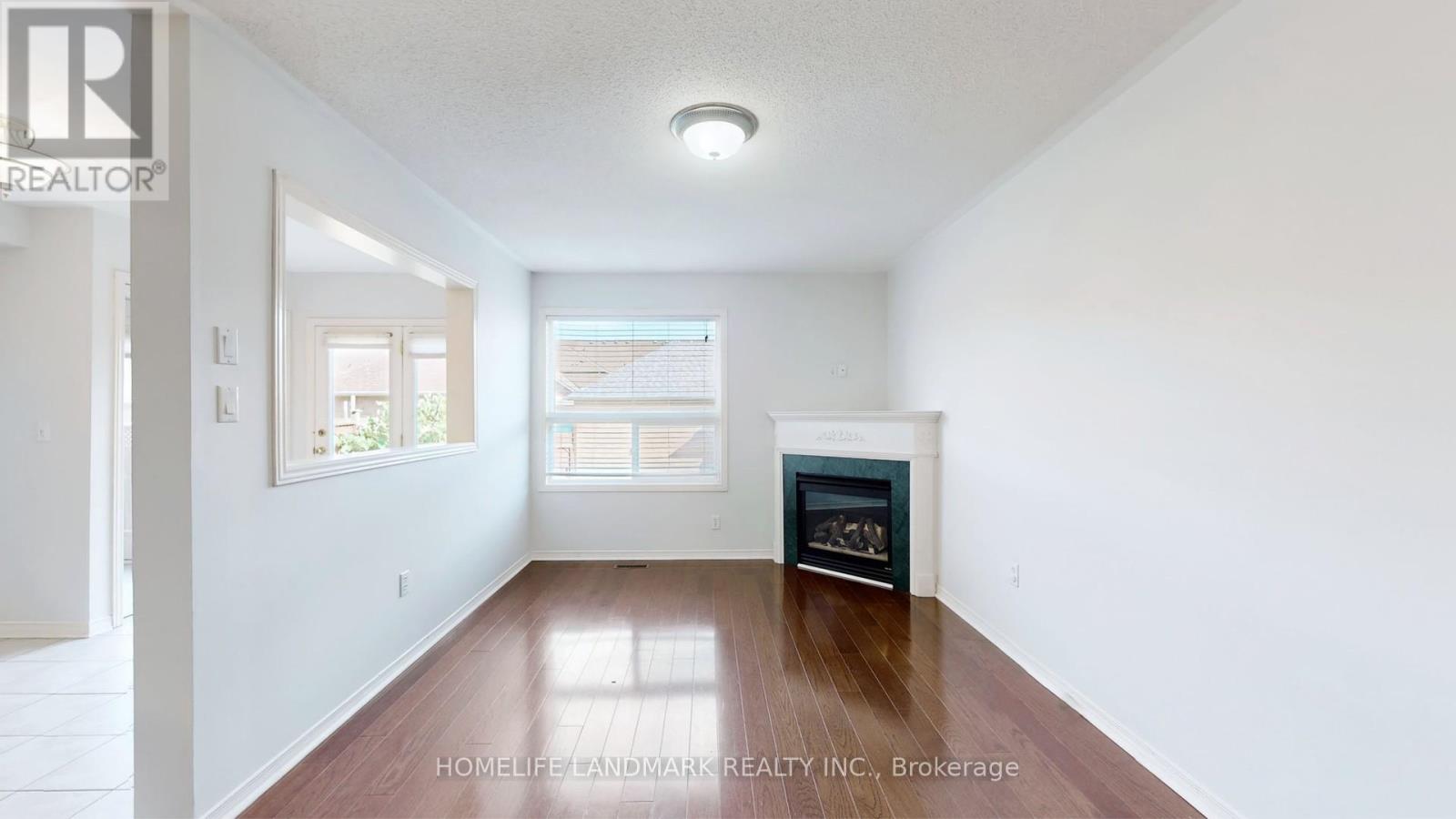 60 Cariglia Trail, Markham, Ontario  L3R 4W8 - Photo 5 - N12575348