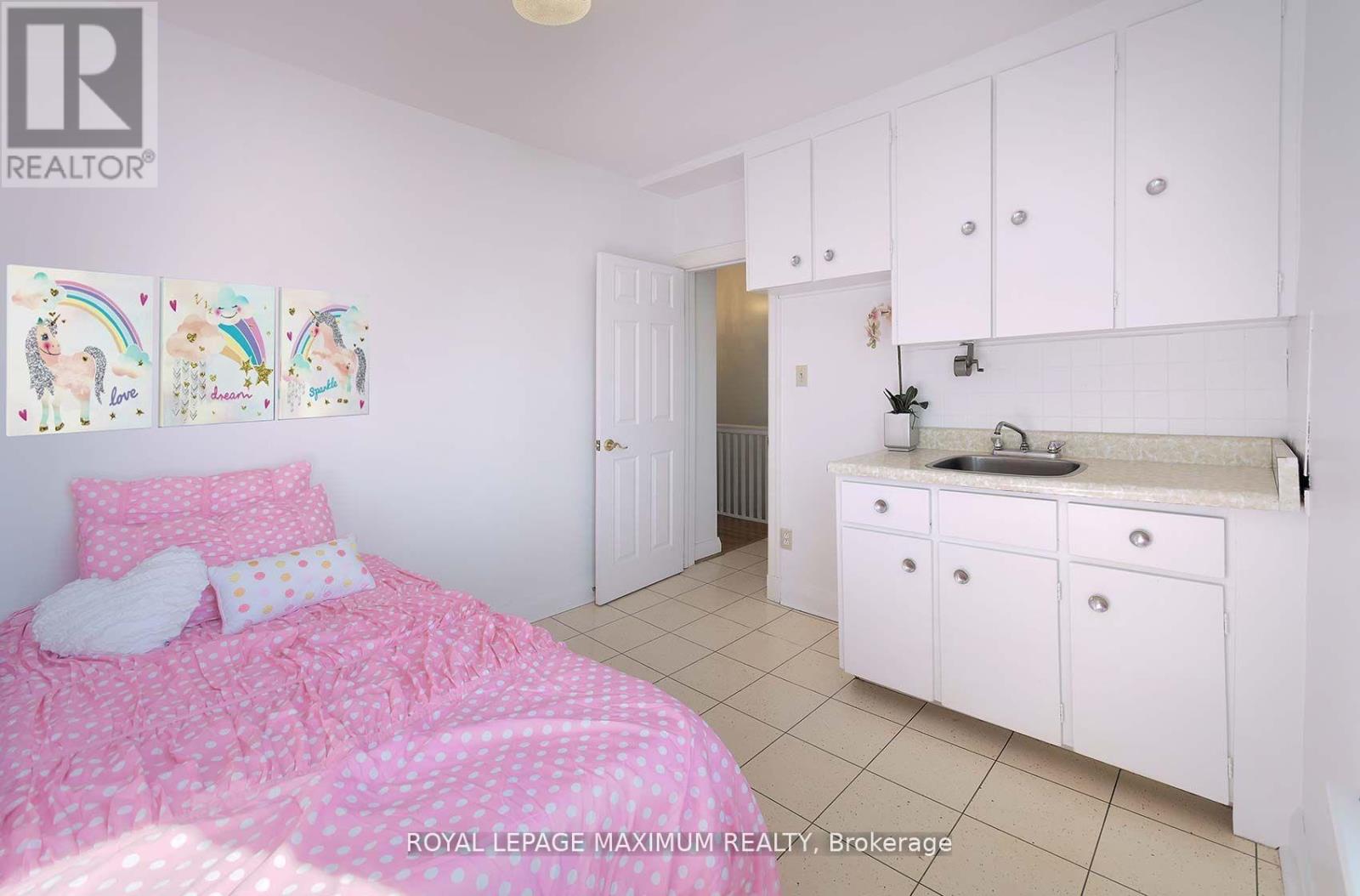 245 Belgravia Avenue, Toronto, Ontario  M6E 2M9 - Photo 25 - W12575590