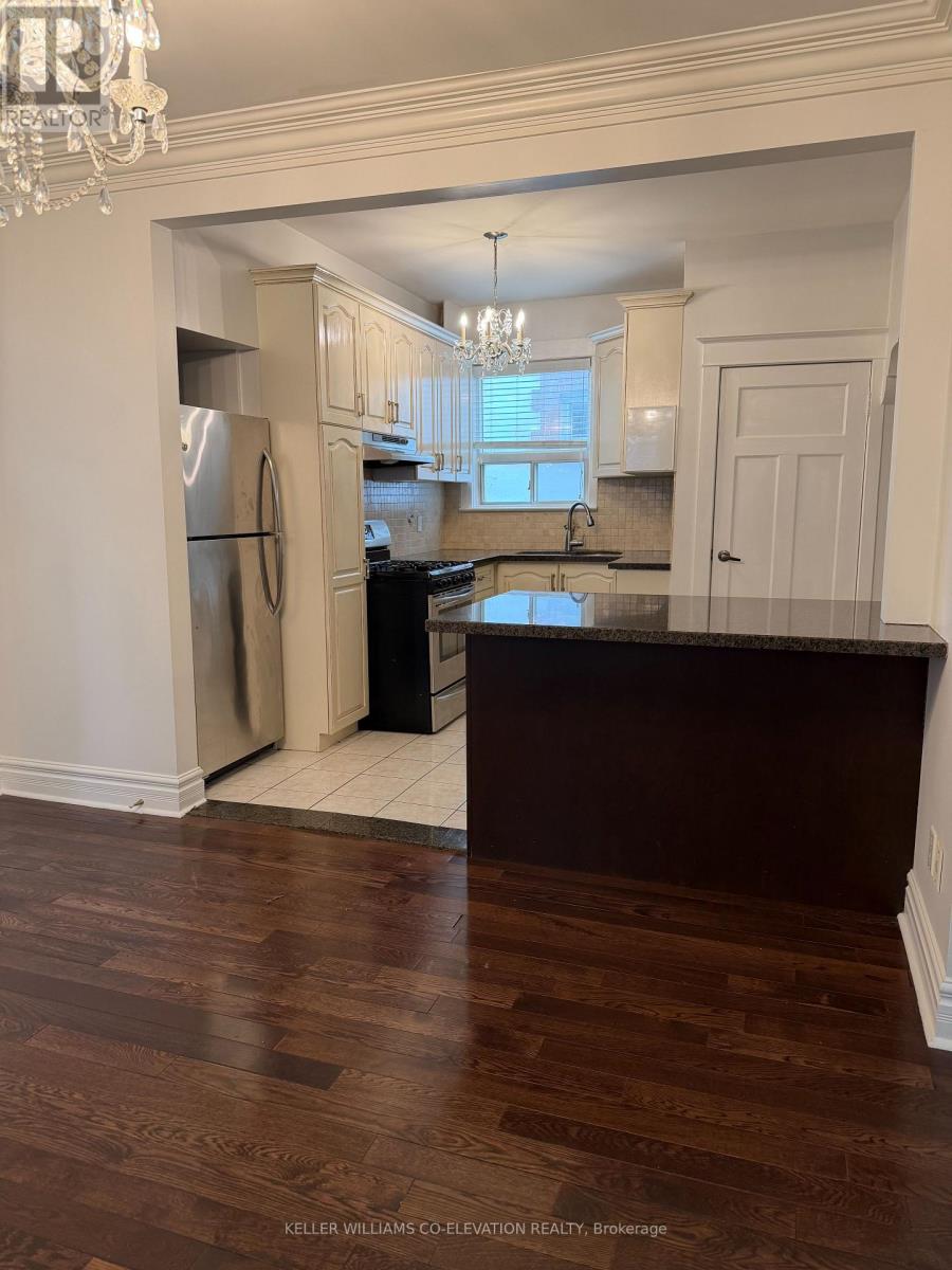 Main Fl - 41 Northcliffe Boulevard, Toronto, Ontario  M6H 3G9 - Photo 8 - C12575904