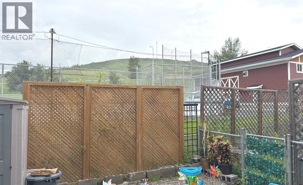 8, 304 Ross Avenue, Cochrane, Alberta  T4C 2J5 - Photo 35 - A2245960