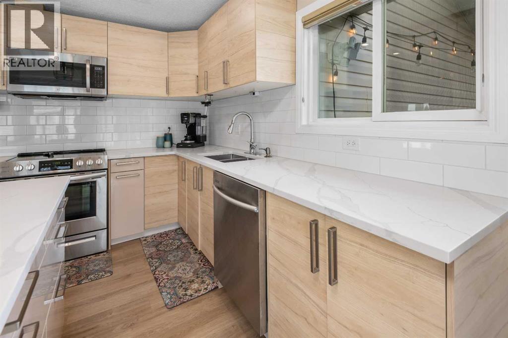 212 Woodbine Boulevard Sw, Calgary, Alberta  T2W 4K5 - Photo 17 - A2255159