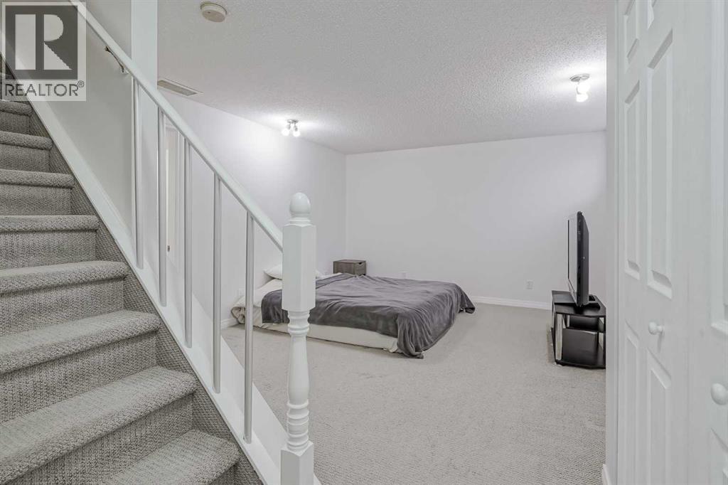 4 Bridleridge Circle Sw, Calgary, Alberta  T2Y 4L2 - Photo 30 - A2267376