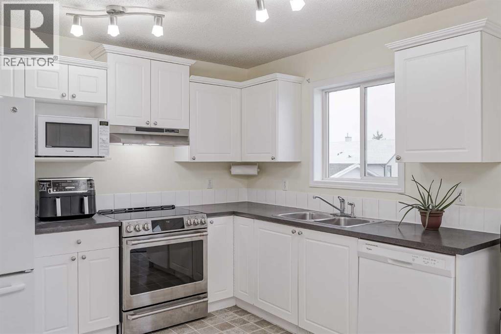 4 Bridleridge Circle Sw, Calgary, Alberta  T2Y 4L2 - Photo 12 - A2267376