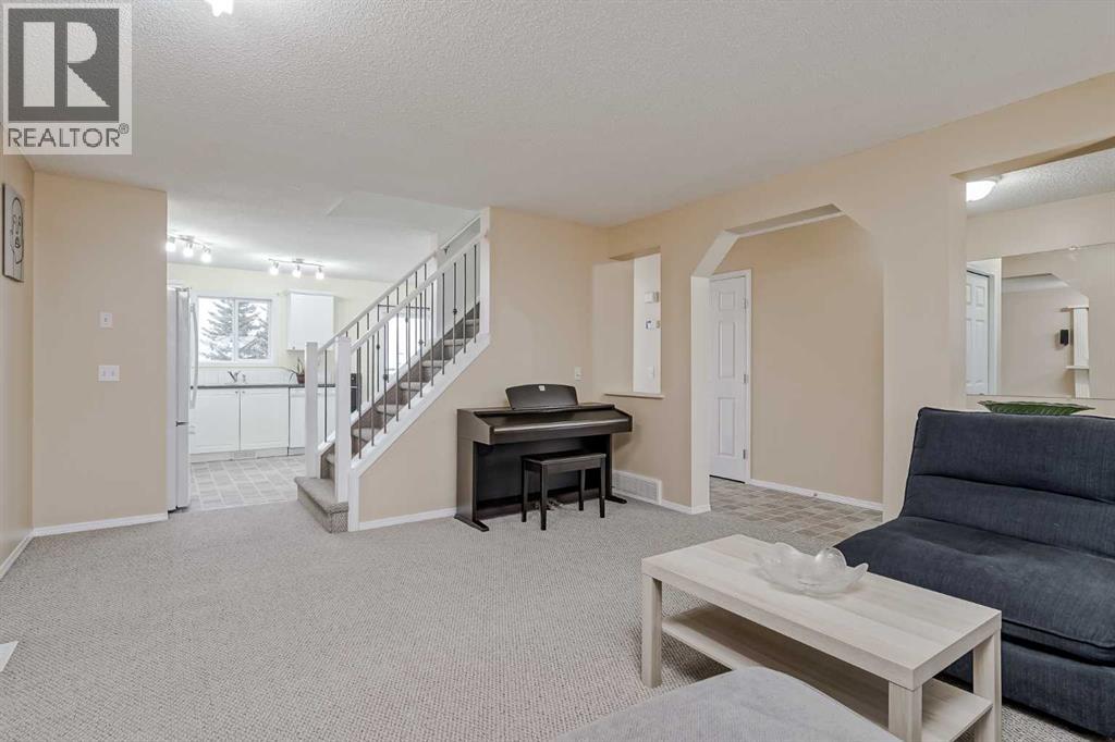 4 Bridleridge Circle Sw, Calgary, Alberta  T2Y 4L2 - Photo 6 - A2267376