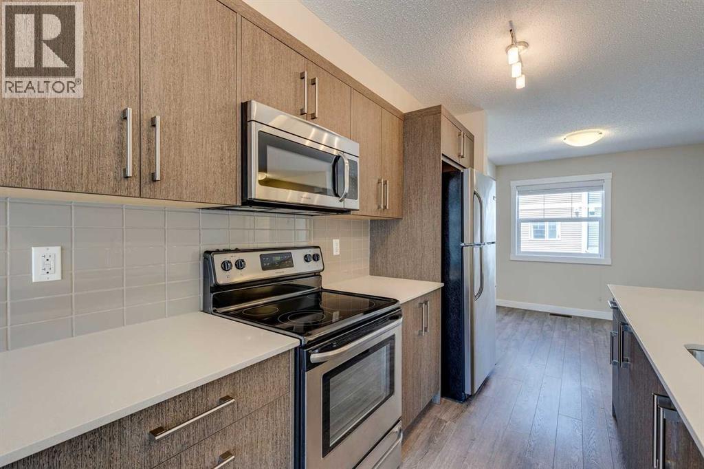 605, 1225 Kings Heights Way Se, Airdrie, Alberta  T4A 0T7 - Photo 6 - A2253218