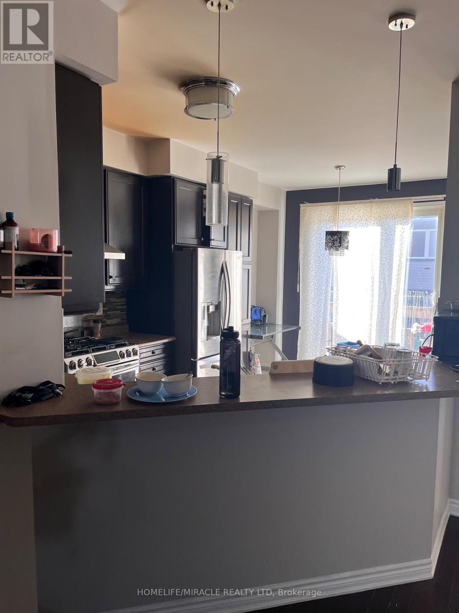 12 Meadowcrest Lane, Brampton, Ontario  L7A 0T8 - Photo 6 - W12569596