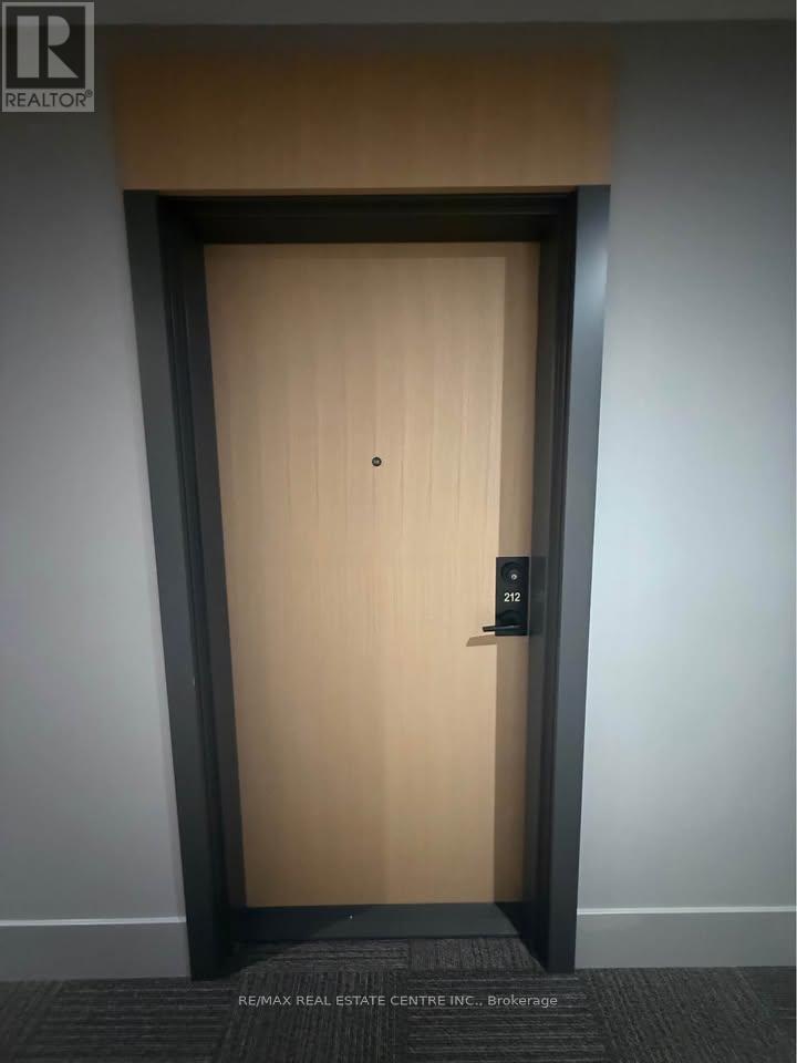 212 - 1440 Clarriage Court, Milton, Ontario  L9T 2X5 - Photo 4 - W12576086