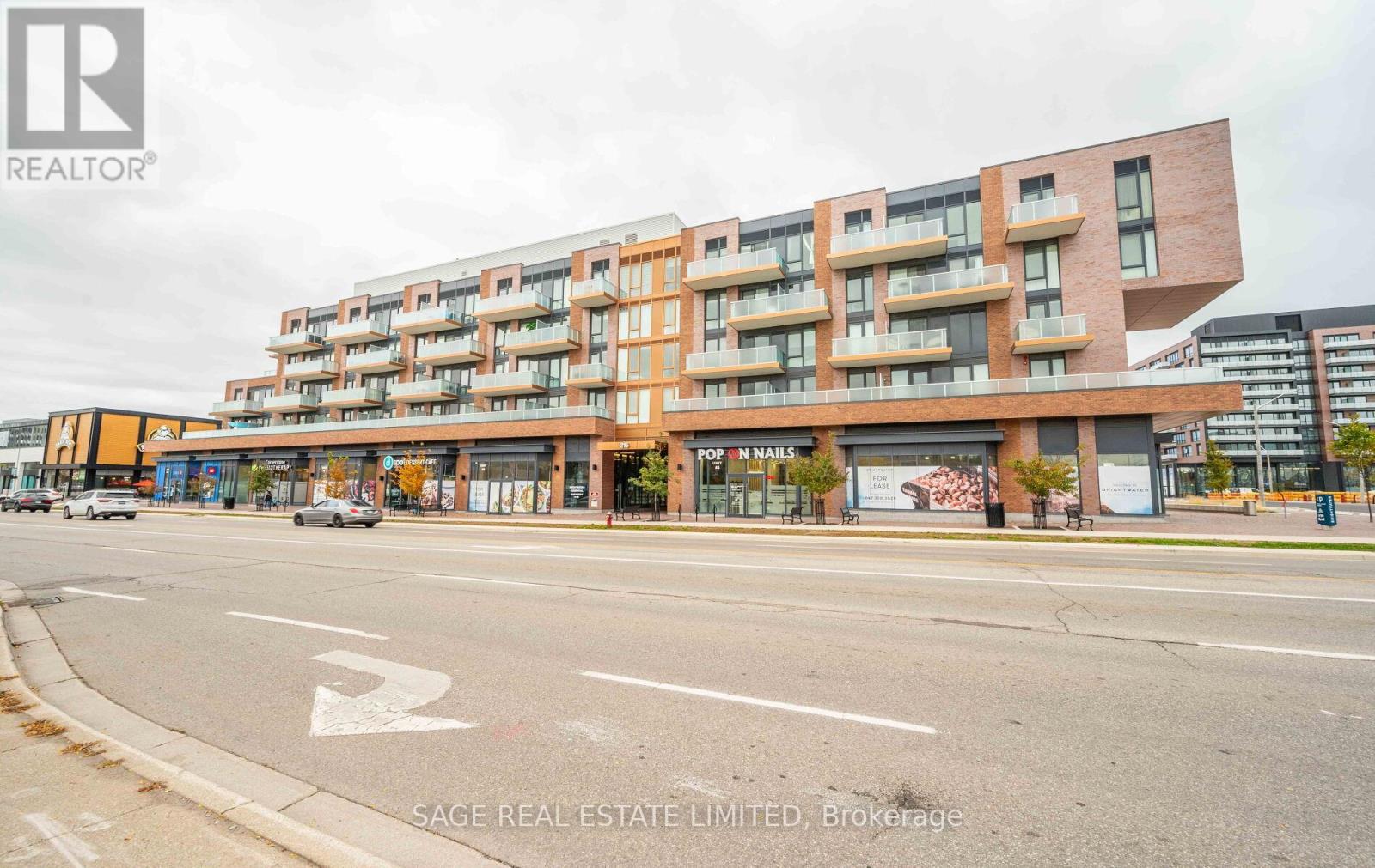 330 - 215 Lakeshore Road W, Mississauga, Ontario  L5H 0A7 - Photo 2 - W12576184