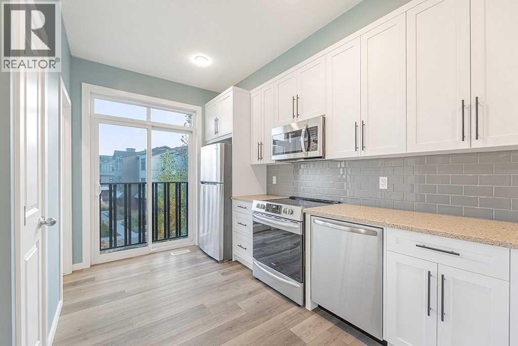 25 Spring Willow Close Sw, Calgary, Alberta  T3H 6E8 - Photo 4 - A2265314