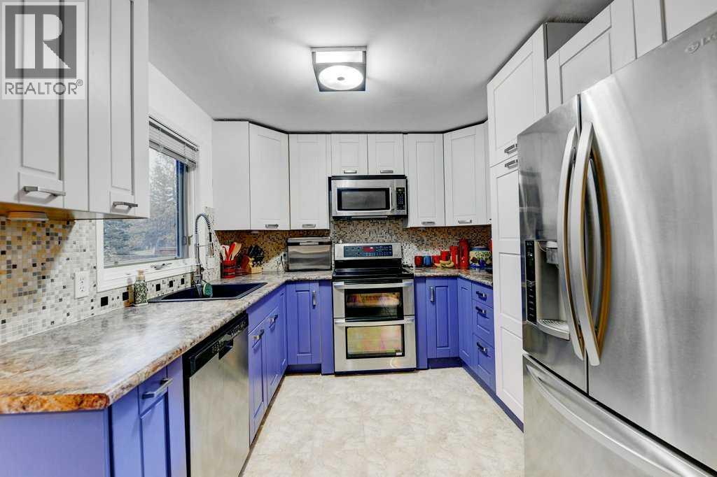 28 Hawktree Circle Nw, Calgary, Alberta  T3G 3M2 - Photo 12 - A2272081