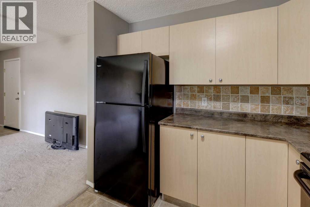 8118, 304 Mackenzie Way Sw, Airdrie, Alberta  T0C 2V0 - Photo 9 - A2267849