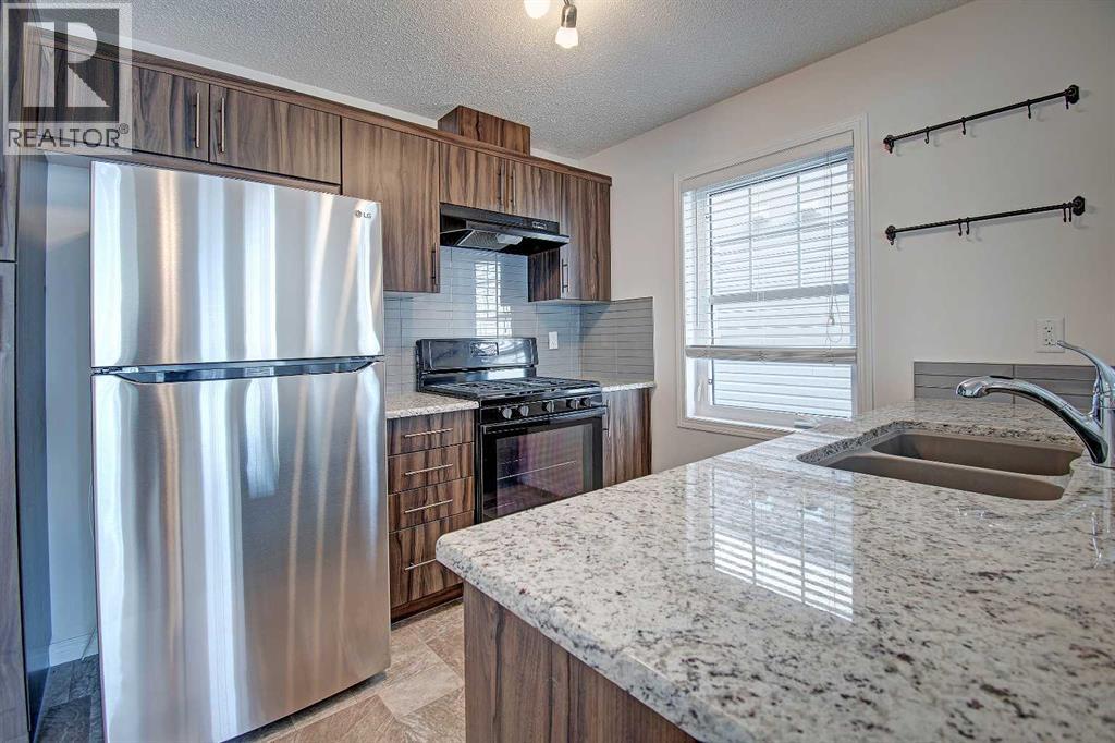 221 Hillcrest Gardens Sw, Airdrie, Alberta  T4B 4J2 - Photo 7 - A2258738