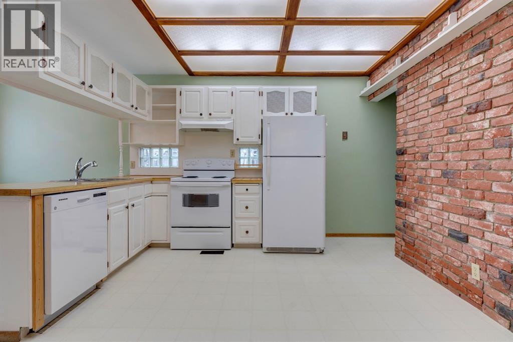 77 Elma Street W, Okotoks, Alberta  T1S 1J8 - Photo 13 - A2272301