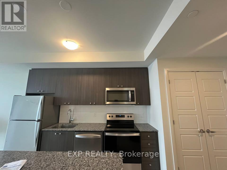 1004 - 1415 Dundas St E, Oakville, Ontario  L6H 8A3 - Photo 3 - W12577228