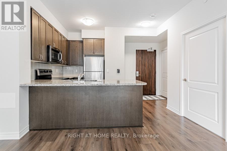 210 - 349 Rathburn Road W, Mississauga, Ontario  L5B 0C8 - Photo 7 - W12577296