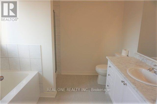 1619 Sorensen Court, Milton, Ontario  L9E 1G8 - Photo 11 - W12577354