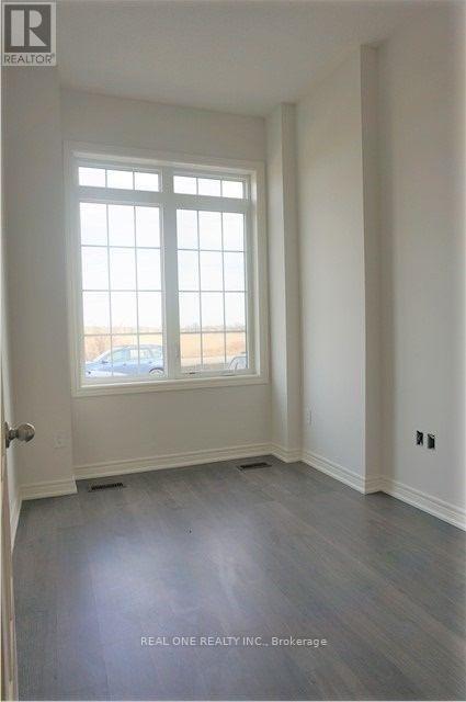 1619 Sorensen Court, Milton, Ontario  L9E 1G8 - Photo 2 - W12577354