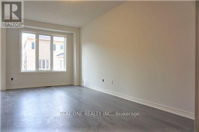 1619 Sorensen Court, Milton, Ontario  L9E 1G8 - Photo 4 - W12577354