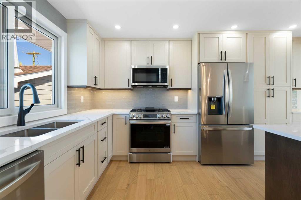 924 Canna Crescent Sw, Calgary, Alberta  T2W 1N9 - Photo 4 - A2271071