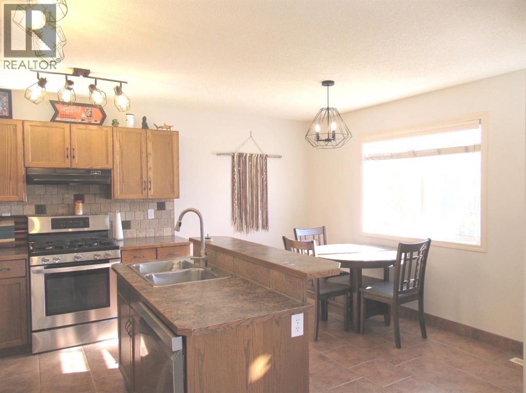 105 Cimarron Park Circle, Okotoks, Alberta  T1S 2H5 - Photo 7 - A2265627