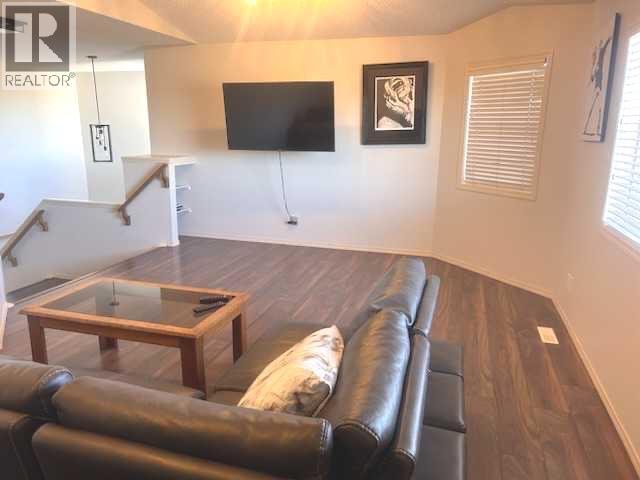 105 Cimarron Park Circle, Okotoks, Alberta  T1S 2H5 - Photo 11 - A2265627