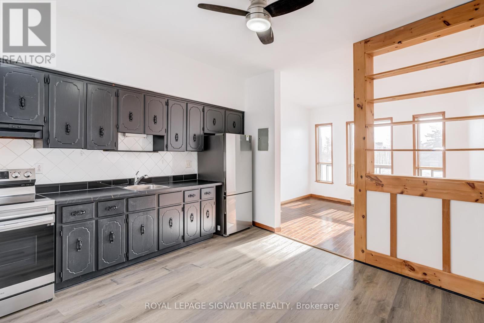 3 - 3038 Dundas Street W, Toronto, Ontario  M6P 1Z5 - Photo 2 - W12569574