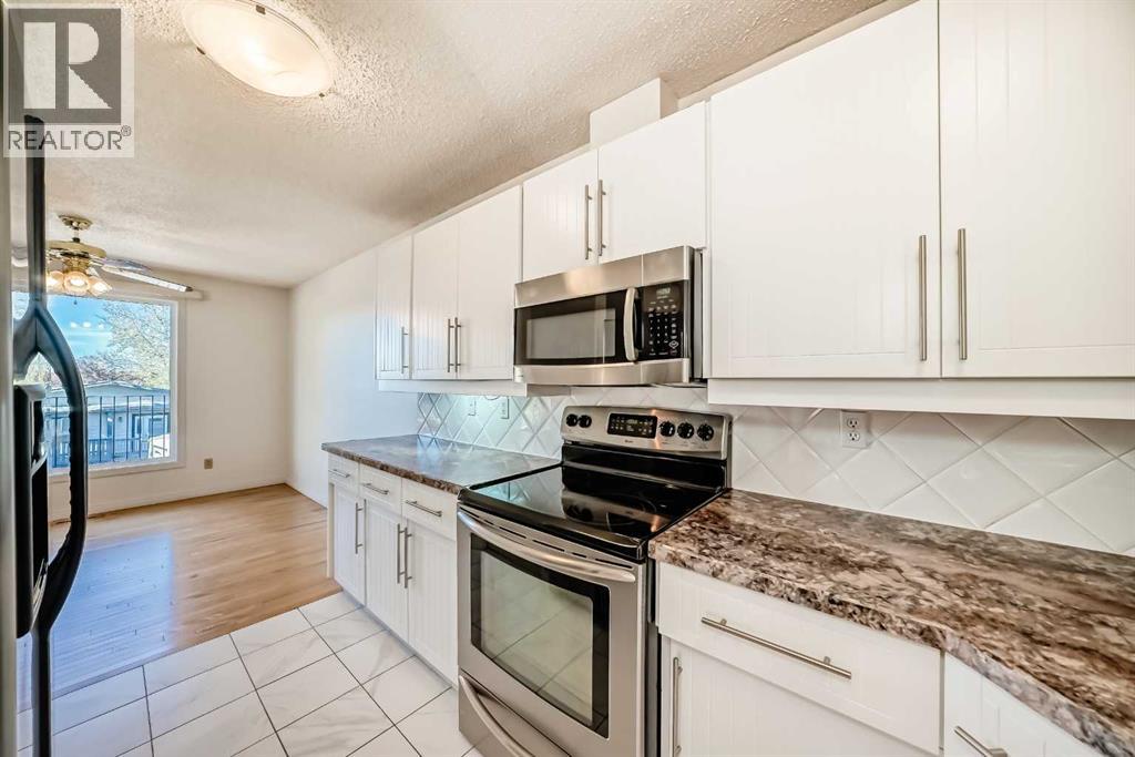 40 Glenpatrick Crescent, Cochrane, Alberta  T0L 0W3 - Photo 6 - A2263301